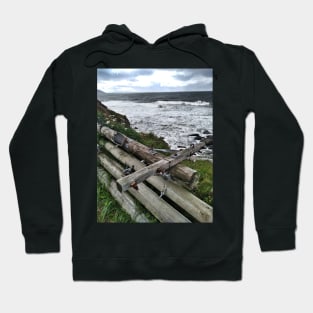 A stack of telegraph poles acting as a barrier, Kintyre, Scotland Hoodie